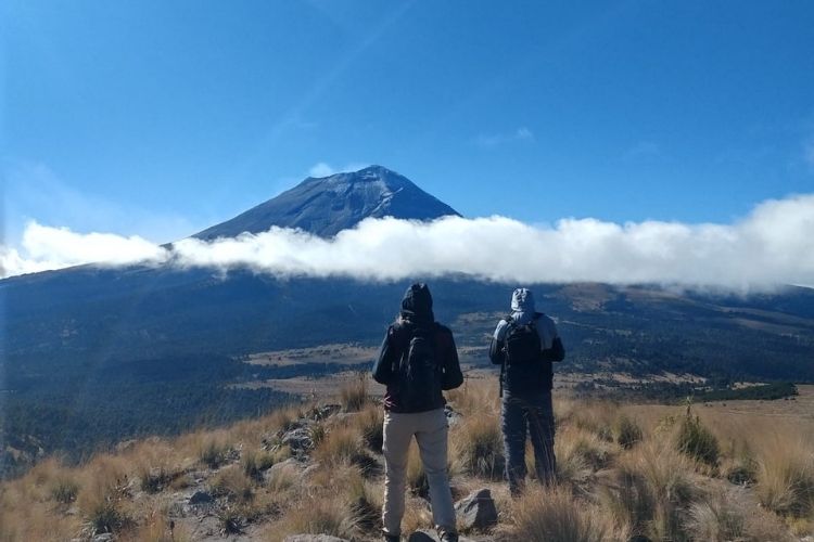 swiss tourists hiking in volcano